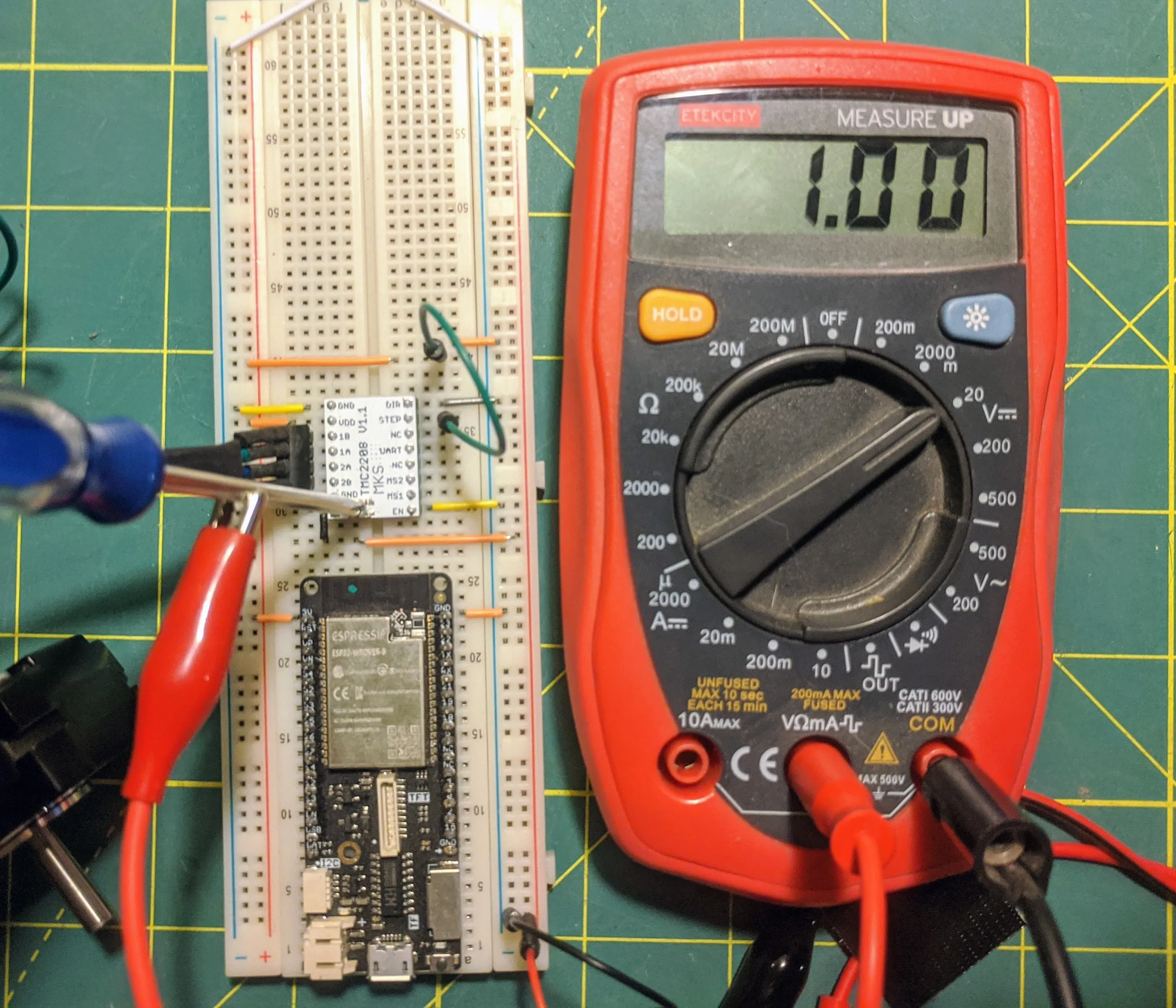 A lead on the screwdriver does the trick using a lead on the screwdriver turning the trimpot to sense voltage