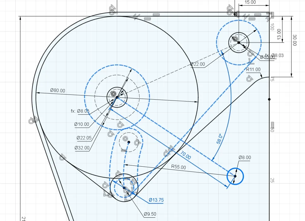 Using a curved slot and tangent lines the path of the belt can be show to run clear of the spooled belt A series of dotted lines describing the path of the motor as it winds and unwinds belt from a spool