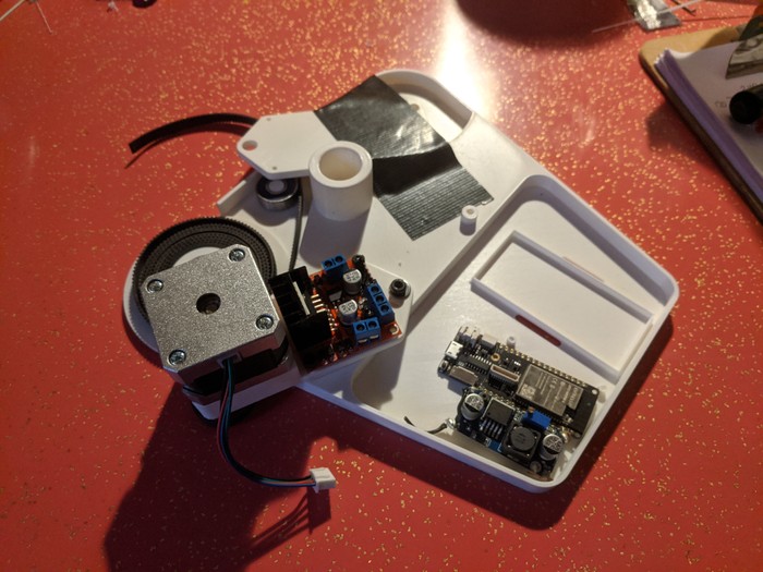 The stepper, belt, bearings, and electronics mounted on a janky chassis