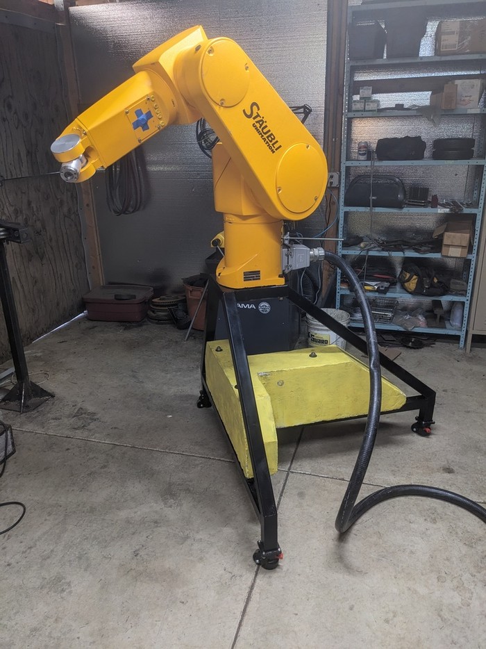the concrete painted yellow inside the frame