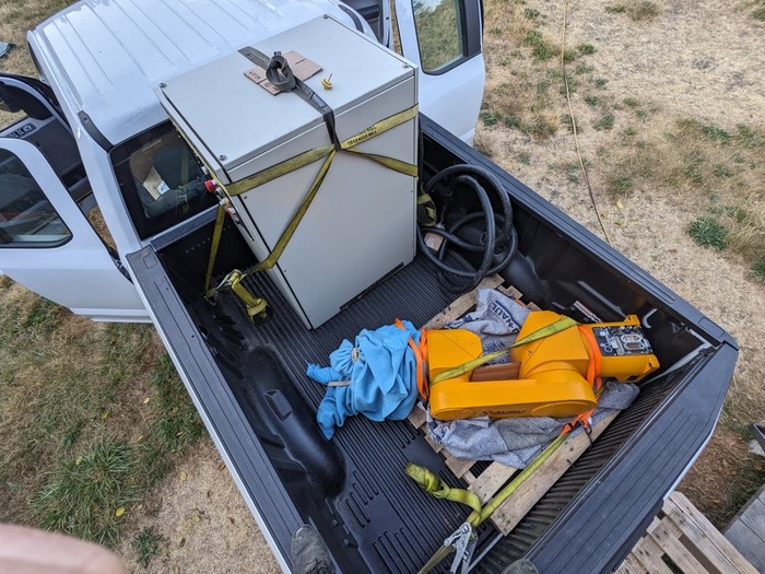 robot and control strapped to a truck