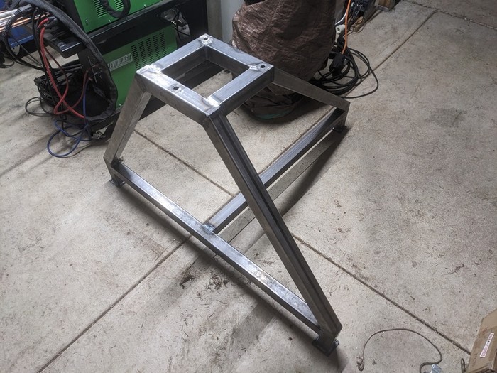 the triangular base rewelded into a T shape